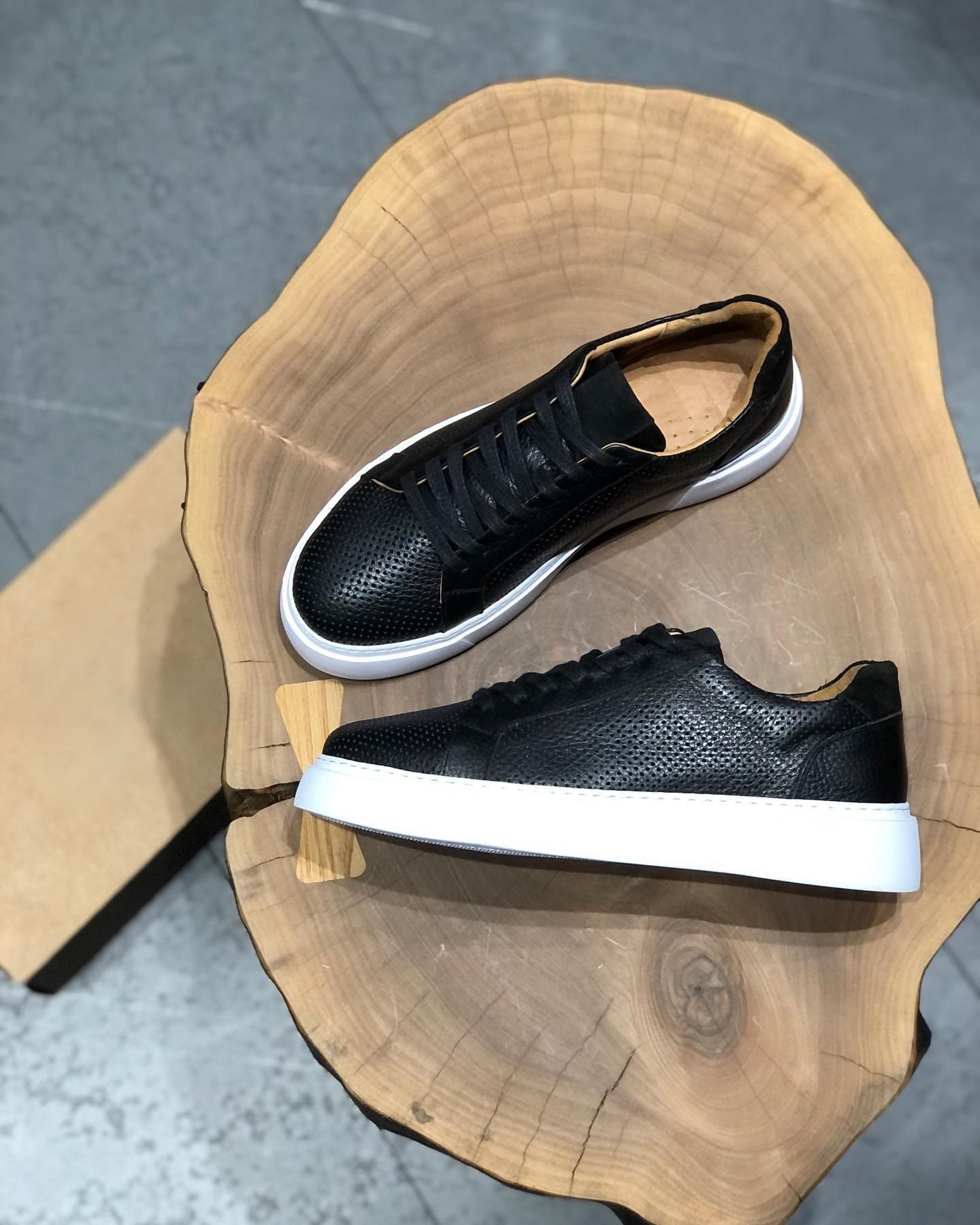 Perforated-design leather sneakers